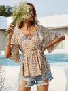 Surplice Neck Belted Ditsy Floral Peplum Top