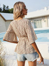 Surplice Neck Belted Ditsy Floral Peplum Top