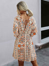 All Over Print Wrap Neck Tie Back Dress