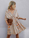 All Over Print Wrap Neck Tie Back Dress