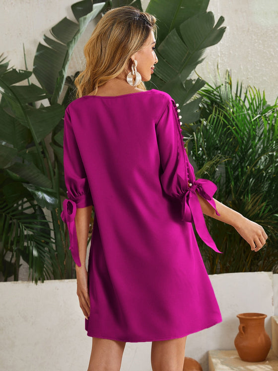 Pearls Cut out Sleeve Knot Cuff Dress