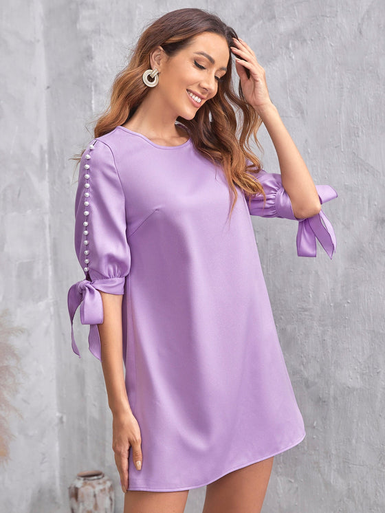 Pearls Cut out Sleeve Knot Cuff Dress