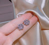 Clubic Zircon Pink Flower-Shaped Stud Earrings