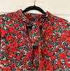 red and green floral long sleeve blouse
