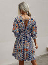 All Over Print Wrap Neck Tie Back Dress