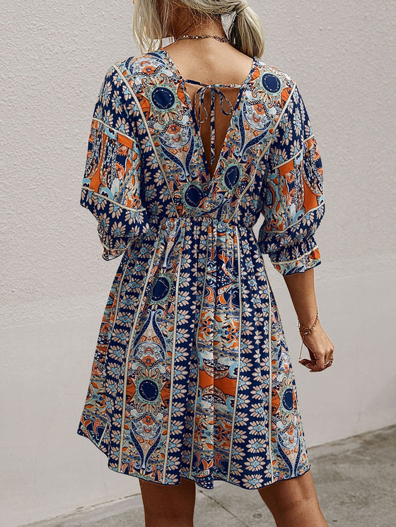 All Over Print Wrap Neck Tie Back Dress